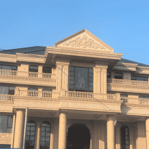 株洲黄金麻别墅外墙干挂石材效果示例